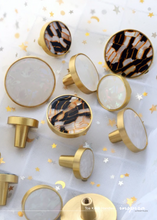 Load image into Gallery viewer, INSPIRA LIFESTYLES - Tos Knob Handles, brass cabinet knobs with decorative inlays, modern round drawer knobs for furniture, closets, wardrobes, and wall hook applications in contemporary interiors