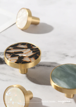 Load image into Gallery viewer, INSPIRA LIFESTYLES - Tos Knob Handles, brass cabinet knobs with decorative inlays, modern round drawer knobs for furniture, closets, wardrobes, and wall hook applications in contemporary interiors