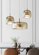 Load image into Gallery viewer, Altura Glass Pendant | INSPIRA LIFESTYLES - amber glass pendant light, smoked glass lighting, modern pendant light, farmhouse pendant light, industrial lighting, kitchen island lighting, bedside pendant light, dining room pendant, minimalist lighting, cluster pendant lights, glass hanging light, residential lighting, hospitality lighting, transitional lighting, contemporary glass pendant, modern light fixtures, modern lighting