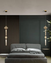 Load image into Gallery viewer, INSPIRA LIFESTYLES | Asterisk Light Sculptural glass pendant light with striped pattern from the Asterisk Light Series, cluster of tubular glass pendants forming a chandelier over stairwell, single striped glass pendant light styled beside bed, modern glass table lamp with striped detailing from the Asterisk Series, floor lamp with sculptural glass shade and minimalist base, high ceiling lighting installation featuring Asterisk pendant cluster, close-up of striped glass tubing on contemporary pendant light.