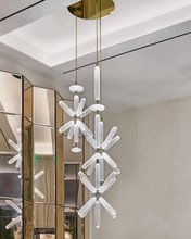 Load image into Gallery viewer, INSPIRA LIFESTYLES | Asterisk Light Sculptural glass pendant light with striped pattern from the Asterisk Light Series, cluster of tubular glass pendants forming a chandelier over stairwell, single striped glass pendant light styled beside bed, modern glass table lamp with striped detailing from the Asterisk Series, floor lamp with sculptural glass shade and minimalist base, high ceiling lighting installation featuring Asterisk pendant cluster, close-up of striped glass tubing on contemporary pendant light.