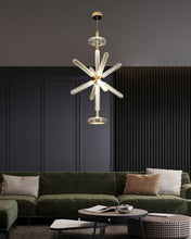 Load image into Gallery viewer, INSPIRA LIFESTYLES | Asterisk Light Sculptural glass pendant light with striped pattern from the Asterisk Light Series, cluster of tubular glass pendants forming a chandelier over stairwell, single striped glass pendant light styled beside bed, modern glass table lamp with striped detailing from the Asterisk Series, floor lamp with sculptural glass shade and minimalist base, high ceiling lighting installation featuring Asterisk pendant cluster, close-up of striped glass tubing on contemporary pendant light.