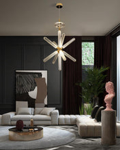 Load image into Gallery viewer, INSPIRA LIFESTYLES | Asterisk Light Sculptural glass pendant light with striped pattern from the Asterisk Light Series, cluster of tubular glass pendants forming a chandelier over stairwell, single striped glass pendant light styled beside bed, modern glass table lamp with striped detailing from the Asterisk Series, floor lamp with sculptural glass shade and minimalist base, high ceiling lighting installation featuring Asterisk pendant cluster, close-up of striped glass tubing on contemporary pendant light.