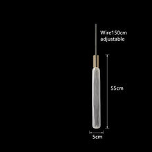 Load image into Gallery viewer, INSPIRA LIFESTYLES | Asterisk Light Sculptural glass pendant light with striped pattern from the Asterisk Light Series, cluster of tubular glass pendants forming a chandelier over stairwell, single striped glass pendant light styled beside bed, modern glass table lamp with striped detailing from the Asterisk Series, floor lamp with sculptural glass shade and minimalist base, high ceiling lighting installation featuring Asterisk pendant cluster, close-up of striped glass tubing on contemporary pendant light.