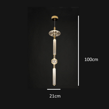 Load image into Gallery viewer, INSPIRA LIFESTYLES | Asterisk Light Sculptural glass pendant light with striped pattern from the Asterisk Light Series, cluster of tubular glass pendants forming a chandelier over stairwell, single striped glass pendant light styled beside bed, modern glass table lamp with striped detailing from the Asterisk Series, floor lamp with sculptural glass shade and minimalist base, high ceiling lighting installation featuring Asterisk pendant cluster, close-up of striped glass tubing on contemporary pendant light.