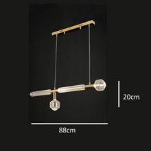 Load image into Gallery viewer, INSPIRA LIFESTYLES | Asterisk Light Sculptural glass pendant light with striped pattern from the Asterisk Light Series, cluster of tubular glass pendants forming a chandelier over stairwell, single striped glass pendant light styled beside bed, modern glass table lamp with striped detailing from the Asterisk Series, floor lamp with sculptural glass shade and minimalist base, high ceiling lighting installation featuring Asterisk pendant cluster, close-up of striped glass tubing on contemporary pendant light.