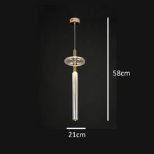 Load image into Gallery viewer, INSPIRA LIFESTYLES | Asterisk Light Sculptural glass pendant light with striped pattern from the Asterisk Light Series, cluster of tubular glass pendants forming a chandelier over stairwell, single striped glass pendant light styled beside bed, modern glass table lamp with striped detailing from the Asterisk Series, floor lamp with sculptural glass shade and minimalist base, high ceiling lighting installation featuring Asterisk pendant cluster, close-up of striped glass tubing on contemporary pendant light.