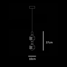 Load image into Gallery viewer, INSPIRA LIFESTYLES | Asterisk Light Sculptural glass pendant light with striped pattern from the Asterisk Light Series, cluster of tubular glass pendants forming a chandelier over stairwell, single striped glass pendant light styled beside bed, modern glass table lamp with striped detailing from the Asterisk Series, floor lamp with sculptural glass shade and minimalist base, high ceiling lighting installation featuring Asterisk pendant cluster, close-up of striped glass tubing on contemporary pendant light.