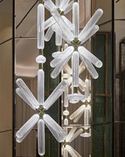 Load image into Gallery viewer, INSPIRA LIFESTYLES | Asterisk Light Sculptural glass pendant light with striped pattern from the Asterisk Light Series, cluster of tubular glass pendants forming a chandelier over stairwell, single striped glass pendant light styled beside bed, modern glass table lamp with striped detailing from the Asterisk Series, floor lamp with sculptural glass shade and minimalist base, high ceiling lighting installation featuring Asterisk pendant cluster, close-up of striped glass tubing on contemporary pendant light.
