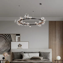 Load image into Gallery viewer, INSPIRA LIFESTYLES – Bubbles Ring Chandelier, modern black iron ring chandelier with clear glass globe bubbles, multi-sized glass globes lighting fixture, contemporary sculptural chandelier for dining rooms, living rooms, foyers, and commercial interiors