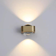 Load image into Gallery viewer, Inspira Lifestyles | Chiaro Wall Sconce with clear glass globe and minimalist Italian design, black/gold/white finish, featuring soft ambient up-and-down LED lighting, ideal for modern living rooms, bedrooms, hallways, and commercial interiors.