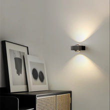 Load image into Gallery viewer, Inspira Lifestyles | Chiaro Wall Sconce with clear glass globe and minimalist Italian design, black/gold/white finish, featuring soft ambient up-and-down LED lighting, ideal for modern living rooms, bedrooms, hallways, and commercial interiors.