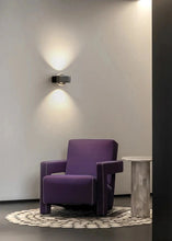 Load image into Gallery viewer, Inspira Lifestyles | Chiaro Wall Sconce with clear glass globe and minimalist Italian design, black/gold/white finish, featuring soft ambient up-and-down LED lighting, ideal for modern living rooms, bedrooms, hallways, and commercial interiors.