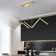 Load image into Gallery viewer, INSPIRA LIFESTYLES - Directions Minimalist Chandelier, LED chandelier, linear pendant light, modern ceiling light, black chandelier, gold chandelier, minimalist lighting, dining room light, kitchen island pendant, contemporary LED fixture, architectural chandelier