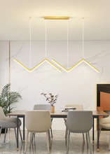 Load image into Gallery viewer, INSPIRA LIFESTYLES - Directions Minimalist Chandelier, LED chandelier, linear pendant light, modern ceiling light, black chandelier, gold chandelier, minimalist lighting, dining room light, kitchen island pendant, contemporary LED fixture, architectural chandelier