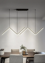 Load image into Gallery viewer, INSPIRA LIFESTYLES - Directions Minimalist Chandelier, LED chandelier, linear pendant light, modern ceiling light, black chandelier, gold chandelier, minimalist lighting, dining room light, kitchen island pendant, contemporary LED fixture, architectural chandelier