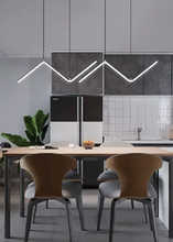 Load image into Gallery viewer, INSPIRA LIFESTYLES - Directions Minimalist Chandelier, LED chandelier, linear pendant light, modern ceiling light, black chandelier, gold chandelier, minimalist lighting, dining room light, kitchen island pendant, contemporary LED fixture, architectural chandelier