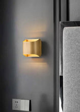 Load image into Gallery viewer, Inspira LIfestyles | Fold Wall Sconce – Modern Minimalist LED Light made of copper finished in Gold or Black
