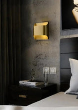 Load image into Gallery viewer, Inspira LIfestyles | Fold Wall Sconce – Modern Minimalist LED Light made of copper finished in Gold or Black