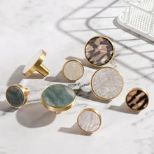 Load image into Gallery viewer, INSPIRA LIFESTYLES - Tos Knob Handles, brass cabinet knobs with decorative inlays, modern round drawer knobs for furniture, closets, wardrobes, and wall hook applications in contemporary interiors
