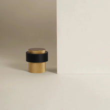 Load image into Gallery viewer, INSPIRA LIFESTYLES - Knurled Floor Door Stops featuring a crisscross diamond knurled pattern and protective rubber bumpers in Matte Black, Satin Brass and Antique Bronze.