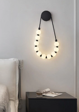 Load image into Gallery viewer, INSPIRA LIFESTYLES - Milli Wall Light, LED wall sconce, frosted globe lighting, sculptural wall lamp, bedroom wall light, living room accent lighting, modern wall sconce, hallway lighting, designer wall fixture, minimalist lighting design, contemporary wall decor, luxury LED light.