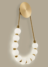 Load image into Gallery viewer, INSPIRA LIFESTYLES - Milli Wall Light, LED wall sconce, frosted globe lighting, sculptural wall lamp, bedroom wall light, living room accent lighting, modern wall sconce, hallway lighting, designer wall fixture, minimalist lighting design, contemporary wall decor, luxury LED light.