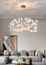 Load image into Gallery viewer, INSPIRA LIFESTYLES - Sculptural Leaf Chandelier, porcelain ginkgo chandelier, cascading porcelain leaf light, gold canopy chandelier, modern statement ceiling light, dining room chandelier, kitchen island pendant light, living room accent lighting, stairwell chandelier, contemporary sculptural light fixture, minimalist gold chandelier, transitional interior lighting, luxury porcelain chandelier, designer lighting fixture