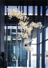 Load image into Gallery viewer, INSPIRA LIFESTYLES - Sculptural Leaf Chandelier, porcelain ginkgo chandelier, cascading porcelain leaf light, gold canopy chandelier, modern statement ceiling light, dining room chandelier, kitchen island pendant light, living room accent lighting, stairwell chandelier, contemporary sculptural light fixture, minimalist gold chandelier, transitional interior lighting, luxury porcelain chandelier, designer lighting fixture