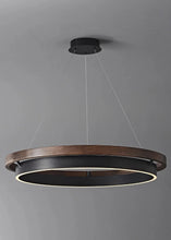 Load image into Gallery viewer, INSPIRA LIFESTYLES – Anello Duo Chandelier – sculptural two-tier chandelier with wood-patterned ring and matte black ring. Modern LED light fixture for dining rooms, living rooms, stairwells, offices, and transitional interiors.