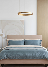Load image into Gallery viewer, INSPIRA LIFESTYLES – Cuff Circular Pendant, modern ring chandelier in rose gold, gold, black, and white, minimalist circular LED pendant light for dining rooms, conference rooms, double-height spaces, and contemporary interiors