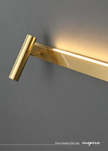 Load image into Gallery viewer, INSPIRA LIFESTYLES – Dueci Reading Wall Light, modern multi-directional reading light, up and down LED wall lamp, architectural bedside lighting, Italian minimalist wall sconce, contemporary wall light with adjustable head, 90 degree pivot reading sconce, dual directional wall fixture, bedroom reading light, living room accent lighting, hotel guest room lighting, solid copper wall light, gold wall light, black wall light, linear architectural sconce, linear wall light, linear LED wall light, wall sconce
