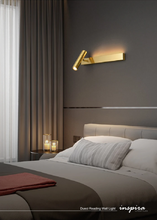Load image into Gallery viewer, INSPIRA LIFESTYLES – Dueci Reading Wall Light, modern multi-directional reading light, up and down LED wall lamp, architectural bedside lighting, Italian minimalist wall sconce, contemporary wall light with adjustable head, 90 degree pivot reading sconce, dual directional wall fixture, bedroom reading light, living room accent lighting, hotel guest room lighting, solid copper wall light, gold wall light, black wall light, linear architectural sconce, linear wall light, linear LED wall light, wall sconce