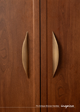 Load image into Gallery viewer, INSPIRA LIFESTYLES – Fin Antique Bronze Handles, curved cabinet pull, sculptural bronze hardware, organic modern cabinet handle, antique bronze drawer pull, designer cabinetry hardware