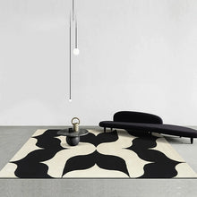 Load image into Gallery viewer, INSPIRA LIFESTYLES – Monarc Area Rug, black and ivory geometric rug, 100% polyester rug, soft and durable area rug, modern patterned rug, abstract design rug, contemporary interior rug, high-performance rug, easy-clean rug, living room rug, dining room rug, designer rug décor