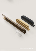 Load image into Gallery viewer, INSPIRA LIFESTYLES - RIVA PULL HANDLES, EDGE PULL HANDLES, SOLID BRASS CABINET HANDLE, MODERN ARC HANDLE, ERGONOMIC CABINET PULL, MINIMAL CABINET HARDWARE, BUILT IN EDGE PULL, KITCHEN DRAWER EDGE HANDLE, ANTIQUE BRONZE CABINET HANDLE, BRUSHED GOLD EDGE PULL, BLACK CABINET HARDWARE, WHITE CABINET HANDLE, ARCHITECTURAL CABINET HARDWARE, CONTEMPORARY MILLWORK HARDWARE, INSPIRA LIFESTYLES