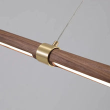 Load image into Gallery viewer, INSPIRA LIFESTYLES |  Klaxon Wood Pendant, Walnut Chandelier Walnut Light, WOODEN LIGHT FIXTURE, WOODEN CHANDELIER, WOOD PENDANT LIGHT, WOOD LIGHT, SIMPLE WOOD LINEAR LIGHT, PENDANT LIGHT FIXTURE, MODERN WOOD CHANDELIER, MODERN PENDANT LIGHT, Modern Dining Room Lighting, Minimalist LED Pendant, Linear Pendant Lighting, LINEAR LIGHT, LED PENDANT, KITCHEN ISLAND LIGHT, HANGING WOOD LIGHT, Dining Table Lighting, Dining Room LED Light, DINING LIGHT, Contemporary Pendant Light, Bar Pendant Lights