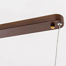 Load image into Gallery viewer, INSPIRA LIFESTYLES |  Klaxon Wood Pendant, Walnut Chandelier Walnut Light, WOODEN LIGHT FIXTURE, WOODEN CHANDELIER, WOOD PENDANT LIGHT, WOOD LIGHT, SIMPLE WOOD LINEAR LIGHT, PENDANT LIGHT FIXTURE, MODERN WOOD CHANDELIER, MODERN PENDANT LIGHT, Modern Dining Room Lighting, Minimalist LED Pendant, Linear Pendant Lighting, LINEAR LIGHT, LED PENDANT, KITCHEN ISLAND LIGHT, HANGING WOOD LIGHT, Dining Table Lighting, Dining Room LED Light, DINING LIGHT, Contemporary Pendant Light, Bar Pendant Lights