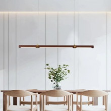 Load image into Gallery viewer, INSPIRA LIFESTYLES |  Klaxon Wood Pendant, Walnut Chandelier Walnut Light, WOODEN LIGHT FIXTURE, WOODEN CHANDELIER, WOOD PENDANT LIGHT, WOOD LIGHT, SIMPLE WOOD LINEAR LIGHT, PENDANT LIGHT FIXTURE, MODERN WOOD CHANDELIER, MODERN PENDANT LIGHT, Modern Dining Room Lighting, Minimalist LED Pendant, Linear Pendant Lighting, LINEAR LIGHT, LED PENDANT, KITCHEN ISLAND LIGHT, HANGING WOOD LIGHT, Dining Table Lighting, Dining Room LED Light, DINING LIGHT, Contemporary Pendant Light, Bar Pendant Lights
