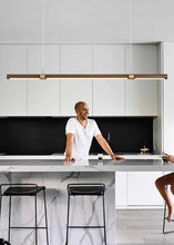 Load image into Gallery viewer, INSPIRA LIFESTYLES |  Klaxon Wood Pendant, Walnut Chandelier Walnut Light, WOODEN LIGHT FIXTURE, WOODEN CHANDELIER, WOOD PENDANT LIGHT, WOOD LIGHT, SIMPLE WOOD LINEAR LIGHT, PENDANT LIGHT FIXTURE, MODERN WOOD CHANDELIER, MODERN PENDANT LIGHT, Modern Dining Room Lighting, Minimalist LED Pendant, Linear Pendant Lighting, LINEAR LIGHT, LED PENDANT, KITCHEN ISLAND LIGHT, HANGING WOOD LIGHT, Dining Table Lighting, Dining Room LED Light, DINING LIGHT, Contemporary Pendant Light, Bar Pendant Lights