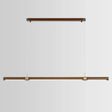 Load image into Gallery viewer, INSPIRA LIFESTYLES |  Klaxon Wood Pendant, Walnut Chandelier Walnut Light, WOODEN LIGHT FIXTURE, WOODEN CHANDELIER, WOOD PENDANT LIGHT, WOOD LIGHT, SIMPLE WOOD LINEAR LIGHT, PENDANT LIGHT FIXTURE, MODERN WOOD CHANDELIER, MODERN PENDANT LIGHT, Modern Dining Room Lighting, Minimalist LED Pendant, Linear Pendant Lighting, LINEAR LIGHT, LED PENDANT, KITCHEN ISLAND LIGHT, HANGING WOOD LIGHT, Dining Table Lighting, Dining Room LED Light, DINING LIGHT, Contemporary Pendant Light, Bar Pendant Lights