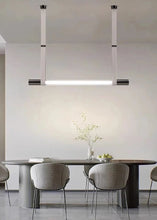 Load image into Gallery viewer, INSPIRA LIFESTYLES - Level Belted Tubular Chandelier, Trendy Modern Pendant, Sleek LED Chandelier, Nordic Chandelier, New Trend Chandelier, Modern Pendant Chandelier, MODERN LIGHTING FIXTURES, MODERN CHANDELIER, MINIMALIST CHANDELIER, Linear Chandelier, LEATHER STRAP LIGHT, LEATHER BELT PENDANT, GLASS LINEAR CHANDELIER, Dining Room Chandelier, Designer Pendant, Glass Tube Chandelier, Contemporary Light, Kitchen Island Light, Dining Table Light, Conference Room Light, Meeting Room Light, Office Light