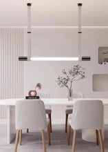 Load image into Gallery viewer, INSPIRA LIFESTYLES - Level Belted Tubular Chandelier, Trendy Modern Pendant, Sleek LED Chandelier, Nordic Chandelier, New Trend Chandelier, Modern Pendant Chandelier, MODERN LIGHTING FIXTURES, MODERN CHANDELIER, MINIMALIST CHANDELIER, Linear Chandelier, LEATHER STRAP LIGHT, LEATHER BELT PENDANT, GLASS LINEAR CHANDELIER, Dining Room Chandelier, Designer Pendant, Glass Tube Chandelier, Contemporary Light, Kitchen Island Light, Dining Table Light, Conference Room Light, Meeting Room Light, Office Light