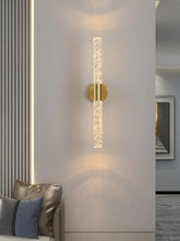 Load image into Gallery viewer, Inspira Lifestyles | Linea Crystal Rod Sconce LED wall lamp – modern crystal rod light fixture for bedroom, vanity, living room, wall sconce lighting, contemporary interior lighting
