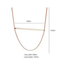Load image into Gallery viewer, Parabola Belt Pendant | INSPIRA LIFESTYLES - Modern Minimalist Belt Pendant Lamp for high ceilings, Glass Tube Pendant Light, Creative LED Lighting Fixture, Living Room Pendant Light, Duplex Villa Pendant Lamp, Staircase Lighting Pendant, Minimalist Glass Tube Lamp, Contemporary LED Pendant Light, Elegant Belt Pendant Lamp, Stylish Modern Lighting, High-End Glass Pendant Light, Modern Living Room Illumination, Chic Duplex Villa Lamp, leather pendant light, industrial modern lighting