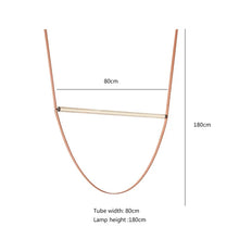 Load image into Gallery viewer, Parabola Belt Pendant | INSPIRA LIFESTYLES - Modern Minimalist Belt Pendant Lamp for high ceilings, Glass Tube Pendant Light, Creative LED Lighting Fixture, Living Room Pendant Light, Duplex Villa Pendant Lamp, Staircase Lighting Pendant, Minimalist Glass Tube Lamp, Contemporary LED Pendant Light, Elegant Belt Pendant Lamp, Stylish Modern Lighting, High-End Glass Pendant Light, Modern Living Room Illumination, Chic Duplex Villa Lamp, leather pendant light, industrial modern lighting