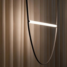 Load image into Gallery viewer, Parabola Belt Pendant | INSPIRA LIFESTYLES - Modern Minimalist Belt Pendant Lamp for high ceilings, Glass Tube Pendant Light, Creative LED Lighting Fixture, Living Room Pendant Light, Duplex Villa Pendant Lamp, Staircase Lighting Pendant, Minimalist Glass Tube Lamp, Contemporary LED Pendant Light, Elegant Belt Pendant Lamp, Stylish Modern Lighting, High-End Glass Pendant Light, Modern Living Room Illumination, Chic Duplex Villa Lamp, leather pendant light, industrial modern lighting