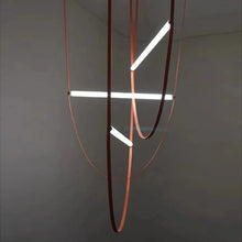 Load image into Gallery viewer, Parabola Belt Pendant | INSPIRA LIFESTYLES - Modern Minimalist Belt Pendant Lamp for high ceilings, Glass Tube Pendant Light, Creative LED Lighting Fixture, Living Room Pendant Light, Duplex Villa Pendant Lamp, Staircase Lighting Pendant, Minimalist Glass Tube Lamp, Contemporary LED Pendant Light, Elegant Belt Pendant Lamp, Stylish Modern Lighting, High-End Glass Pendant Light, Modern Living Room Illumination, Chic Duplex Villa Lamp, leather pendant light, industrial modern lighting