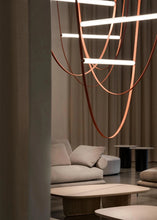 Load image into Gallery viewer, Parabola Belt Pendant | INSPIRA LIFESTYLES - Modern Minimalist Belt Pendant Lamp for high ceilings, Glass Tube Pendant Light, Creative LED Lighting Fixture, Living Room Pendant Light, Duplex Villa Pendant Lamp, Staircase Lighting Pendant, Minimalist Glass Tube Lamp, Contemporary LED Pendant Light, Elegant Belt Pendant Lamp, Stylish Modern Lighting, High-End Glass Pendant Light, Modern Living Room Illumination, Chic Duplex Villa Lamp, leather pendant light, industrial modern lighting