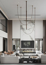 Load image into Gallery viewer, Parabola Belt Pendant | INSPIRA LIFESTYLES - Modern Minimalist Belt Pendant Lamp for high ceilings, Glass Tube Pendant Light, Creative LED Lighting Fixture, Living Room Pendant Light, Duplex Villa Pendant Lamp, Staircase Lighting Pendant, Minimalist Glass Tube Lamp, Contemporary LED Pendant Light, Elegant Belt Pendant Lamp, Stylish Modern Lighting, High-End Glass Pendant Light, Modern Living Room Illumination, Chic Duplex Villa Lamp, leather pendant light, industrial modern lighting
